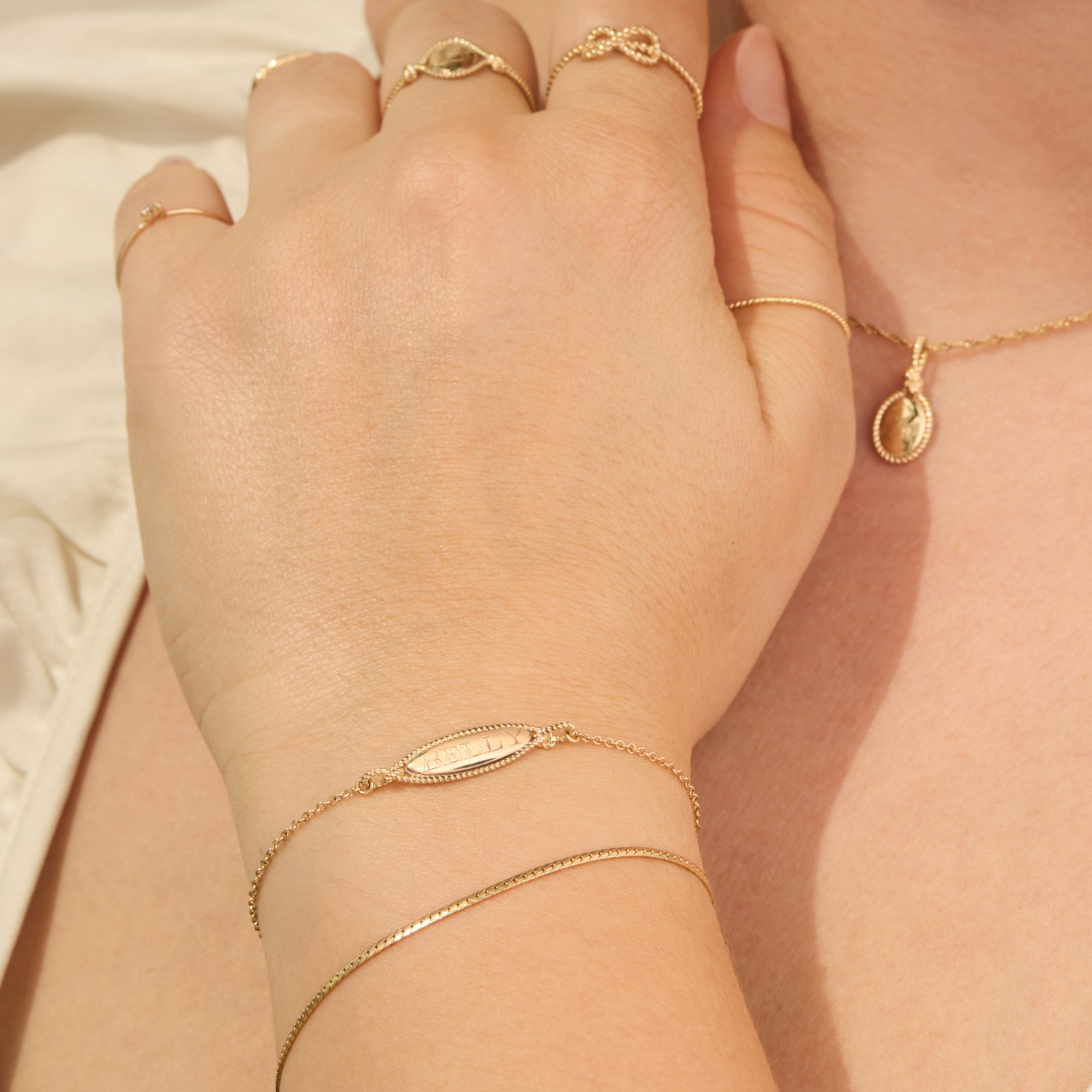 Catbird | The Summer I Turned Pretty - Love Knot Gold Signet Charm