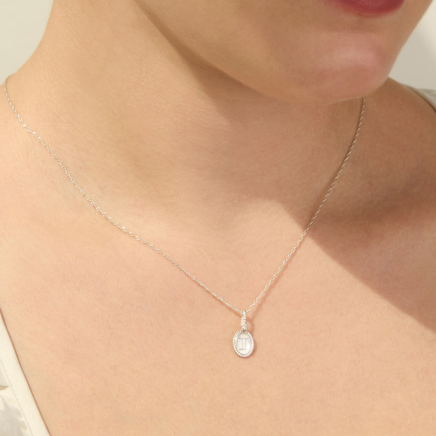 Catbird | The Summer I Turned Pretty - Love Knot Silver Signet Charm