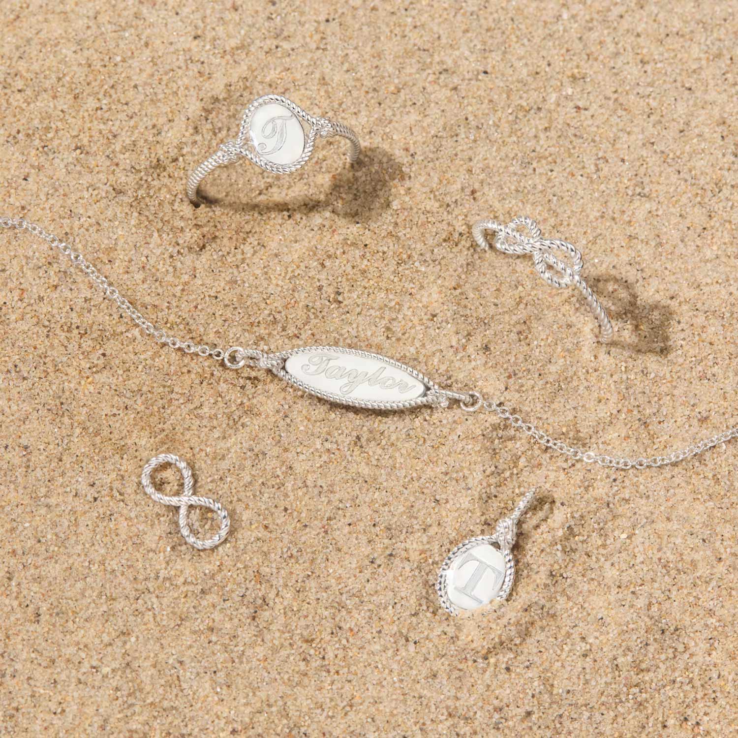 Catbird | The Summer I Turned Pretty - Love Knot Silver Signet Charm