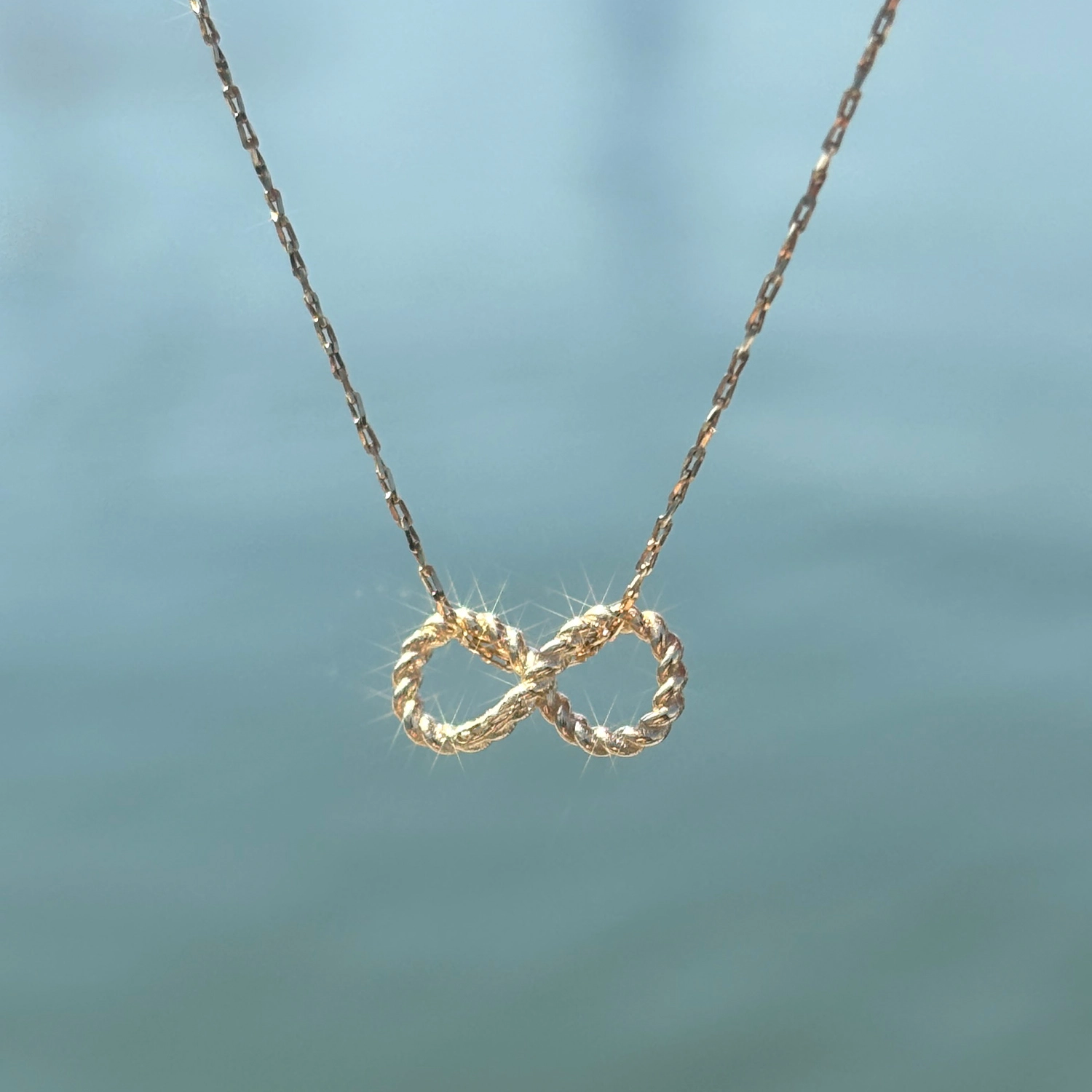 Catbird | The Summer I Turned Pretty - Love Knot Gold Infinity Charm